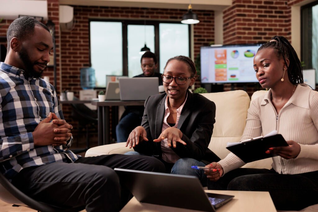 Marketing team discussing custom social media strategy for Nigerian business